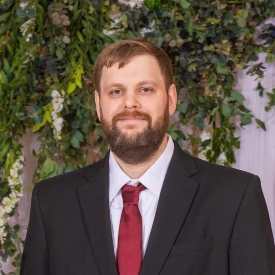 Professional headshot of James Wright